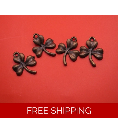 BRONZE COLOURED CLOVER CHARM (x4 )